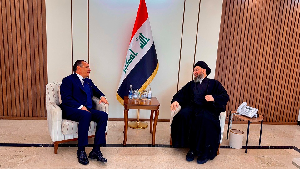 <p>Kamel Ghribi with His Eminence Sayed Ammar Al-Hakim</p>
